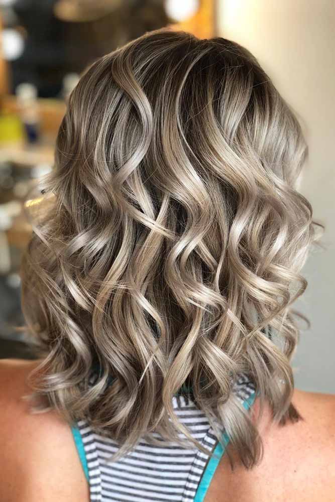 trendy-medium-length-hairstyles-for-thick-hair-layered-curly-lob.jpg